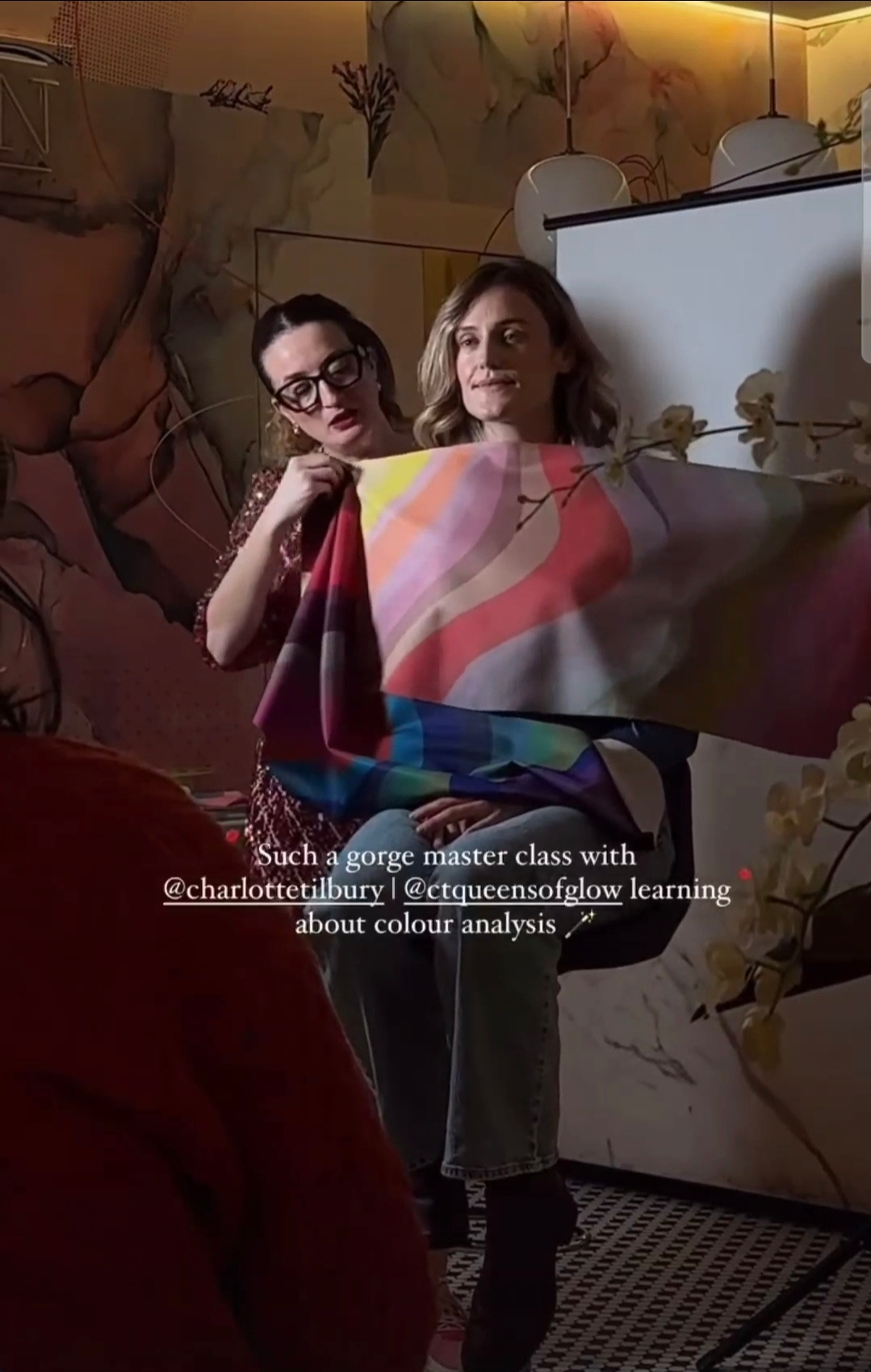 Karina leading a supervised draping session, with the original masterclass caption visible